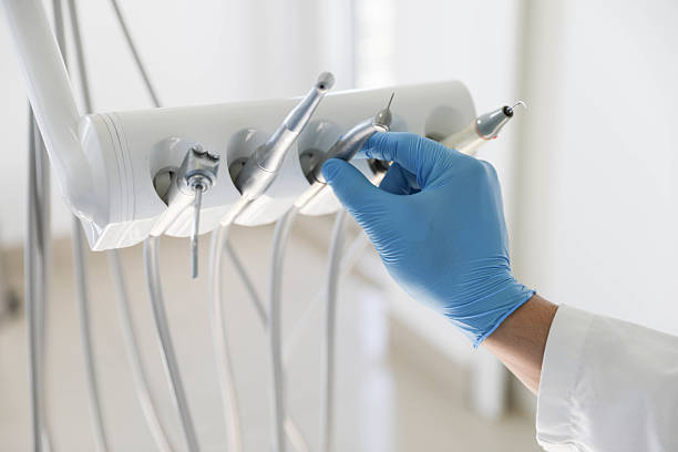 Professional Emergency Dentist technician working in Groveville, NJ